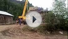 A Crane, A Tank, and the Center of Gravity